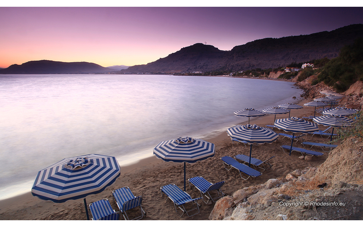 Sunset over Pefkos beach in Rhodes in Greece